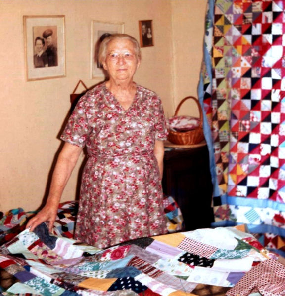 Grossmama and her quilts, January 1967